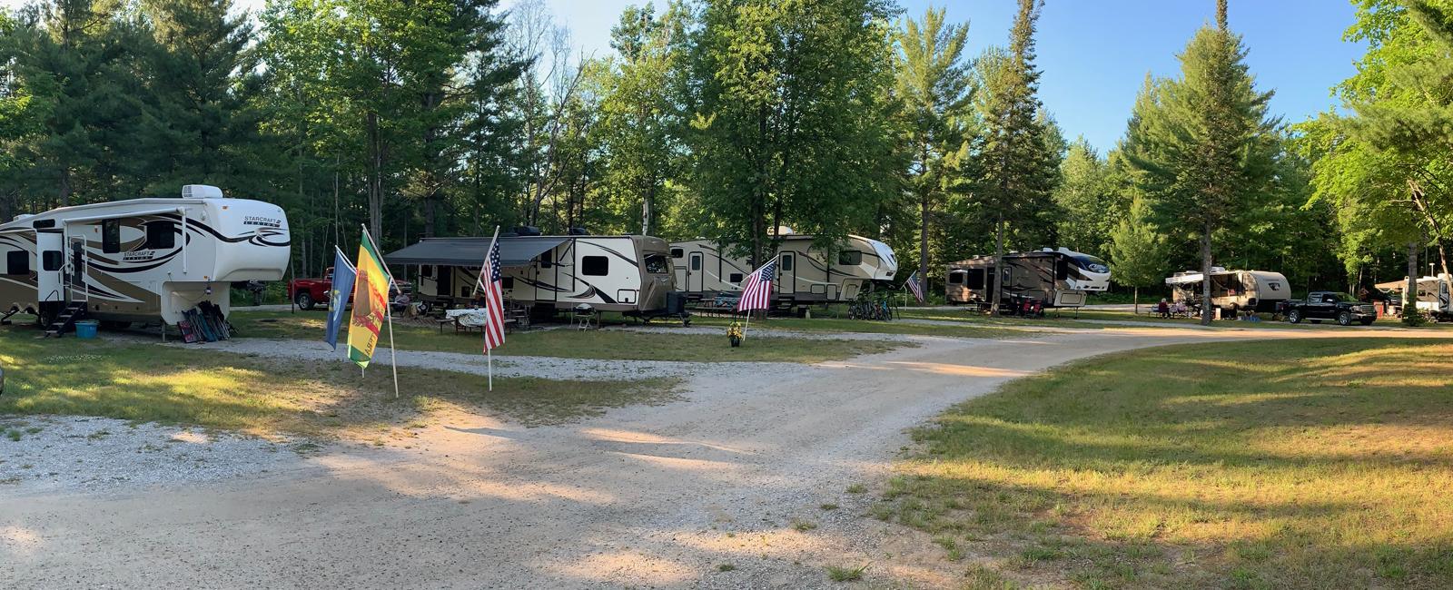 campground with a lot of big trailers and rvs sunny weather