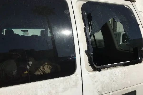 smashed back window from a white van