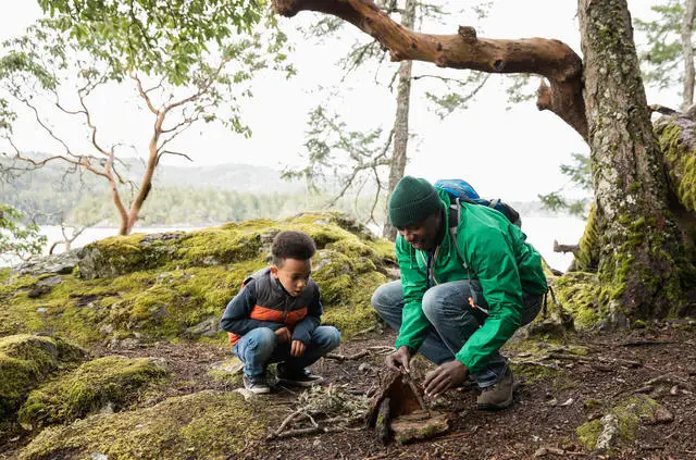 dada and son doing a campfire