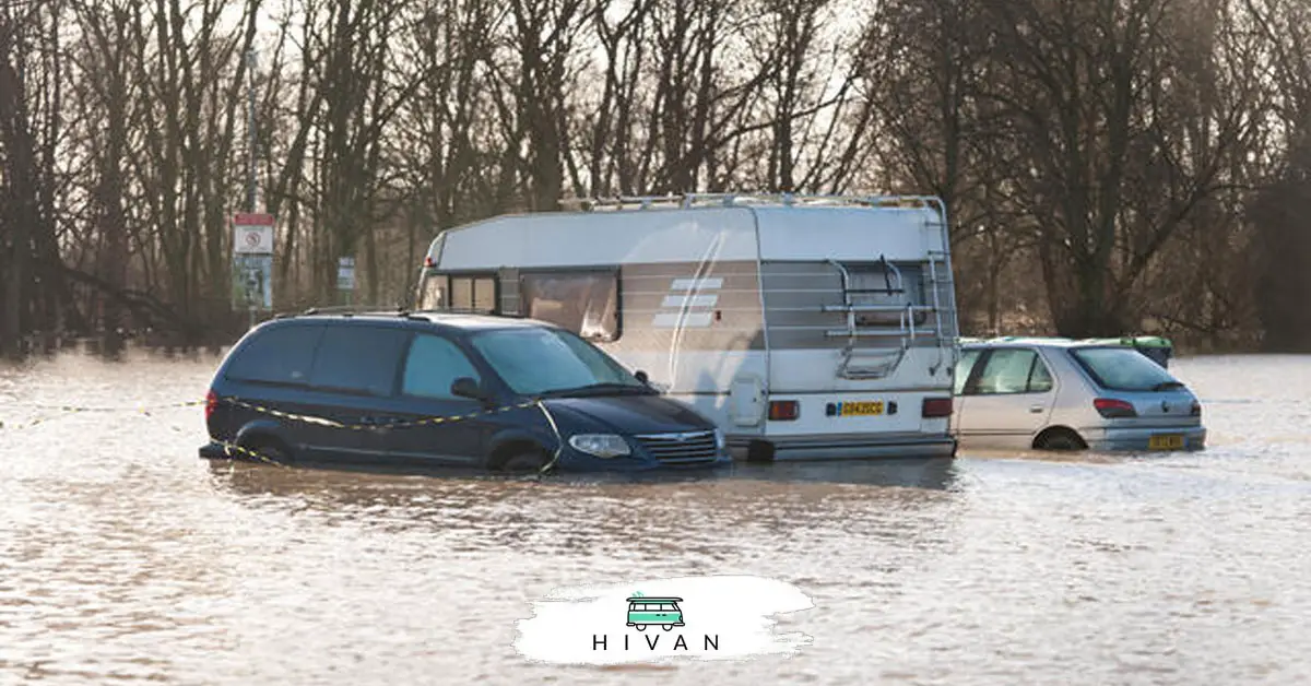 campervan and cars in a flood water