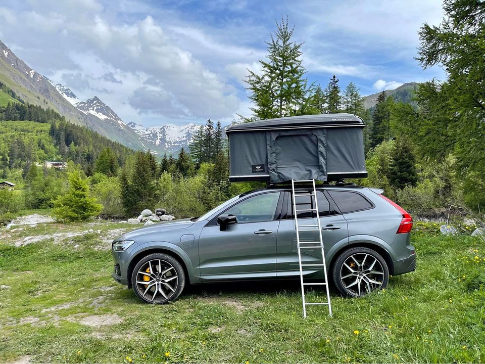 roof tent on a volvo in the nature